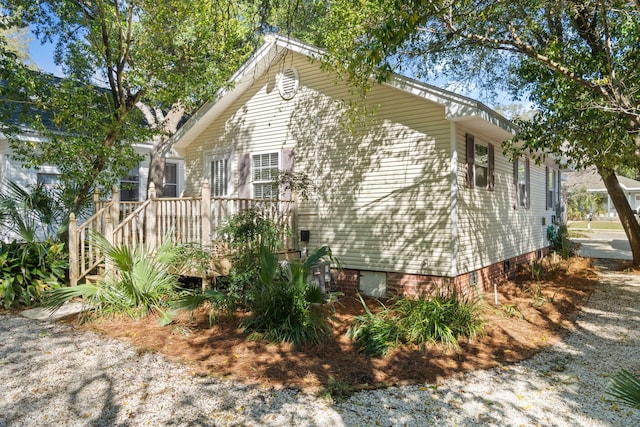 view of property exterior featuring crawl space