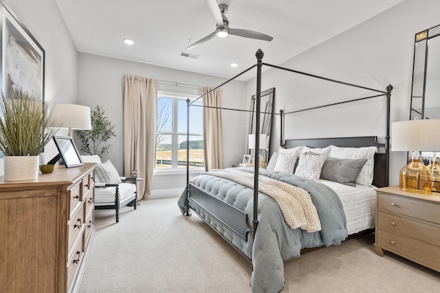 bedroom with ceiling fan, recessed lighting, visible vents, and light colored carpet