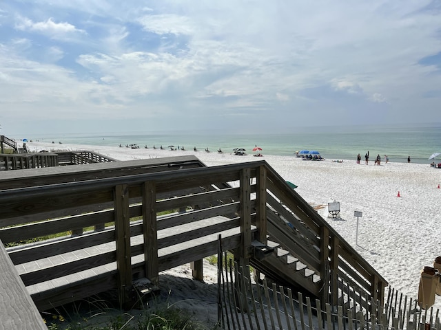 view of community featuring a water view and a view of the beach