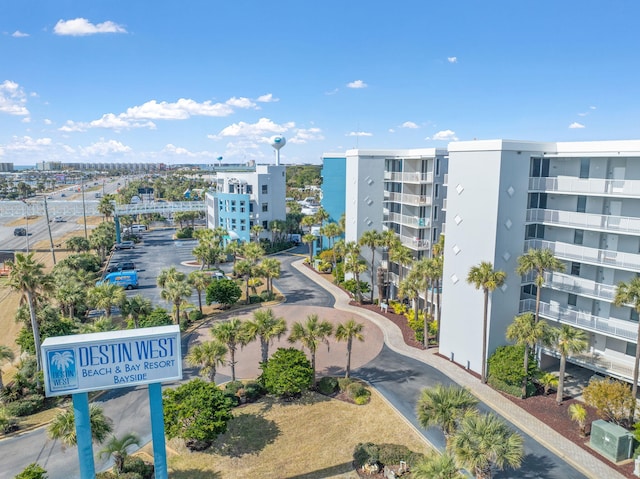 birds eye view of property featuring a city view