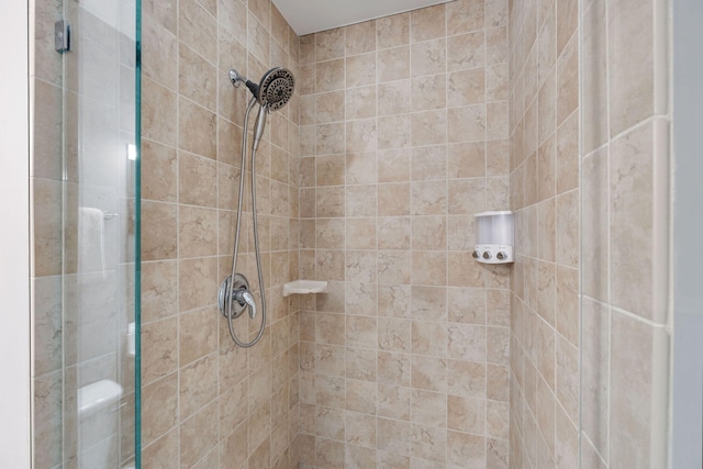 bathroom with a stall shower