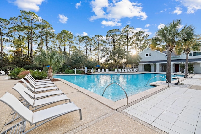 community pool featuring a patio area