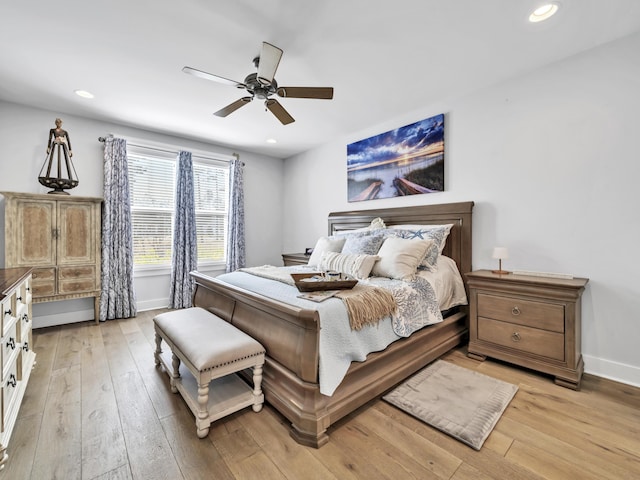 bedroom with light wood-type flooring, baseboards, a ceiling fan, and recessed lighting