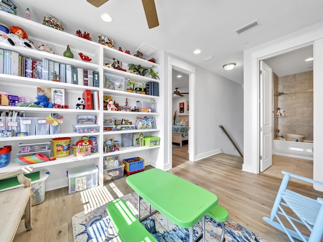 game room with recessed lighting, visible vents, a ceiling fan, wood finished floors, and baseboards