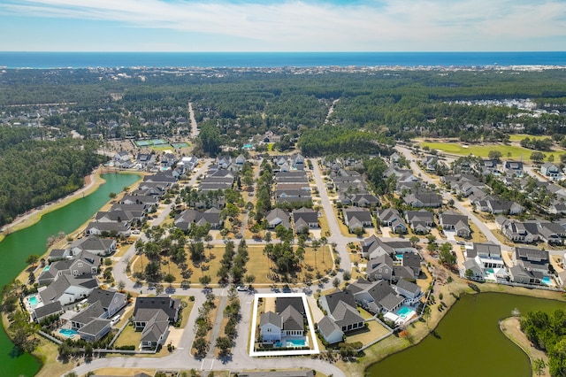 aerial view featuring a water view and a residential view