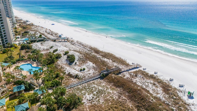 birds eye view of property featuring a view of the beach and a water view