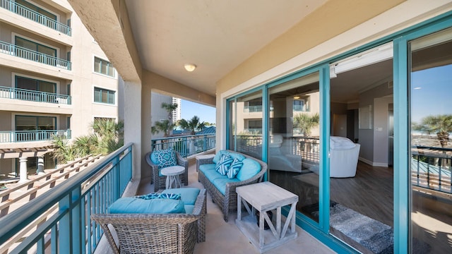 balcony with an outdoor hangout area