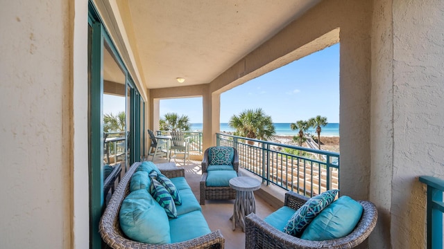 balcony featuring a water view