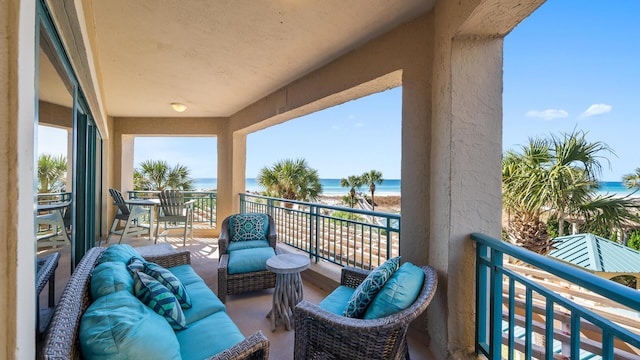 balcony featuring a water view