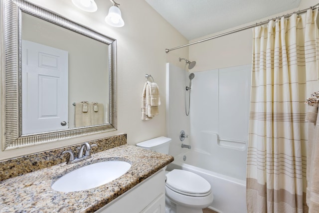 bathroom featuring toilet, shower / tub combo, a textured ceiling, and vanity