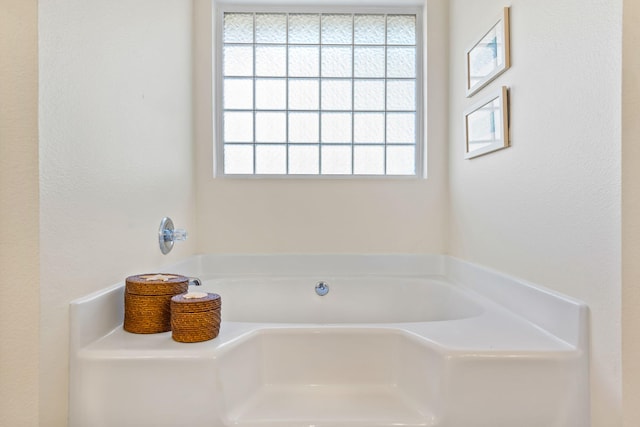 bathroom with a bath