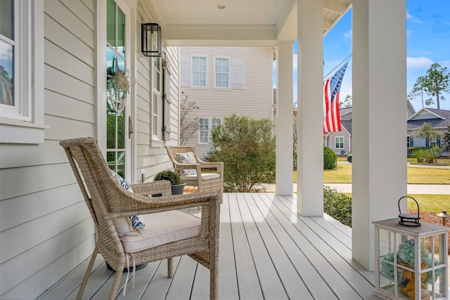 wooden deck with a porch