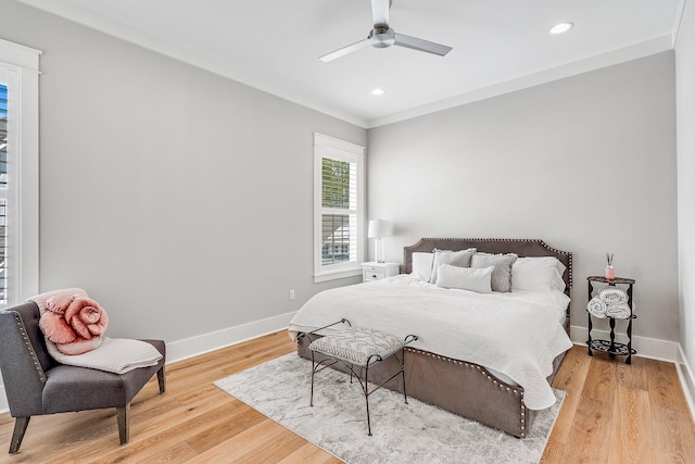 bedroom with light wood-style floors, recessed lighting, ceiling fan, and baseboards