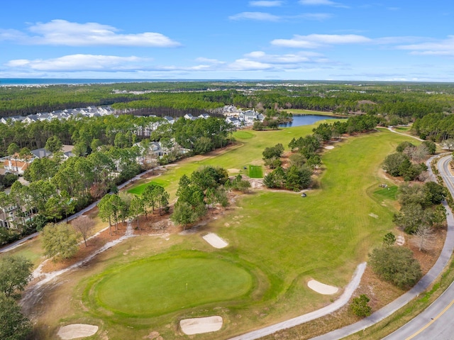 aerial view with a water view and golf course view