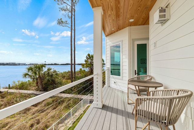 balcony featuring a water view