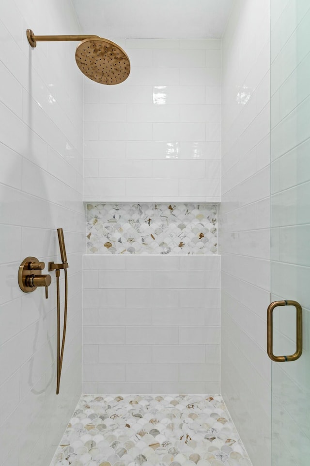 full bathroom featuring a shower stall