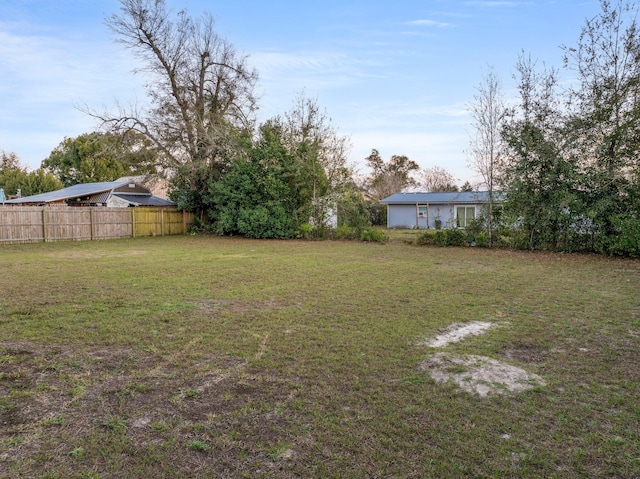 view of yard with fence