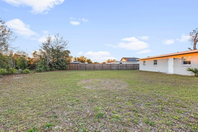 view of yard with fence