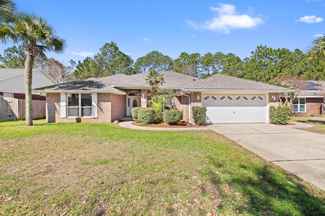 single story home with a garage, concrete driveway, fence, a front lawn, and brick siding