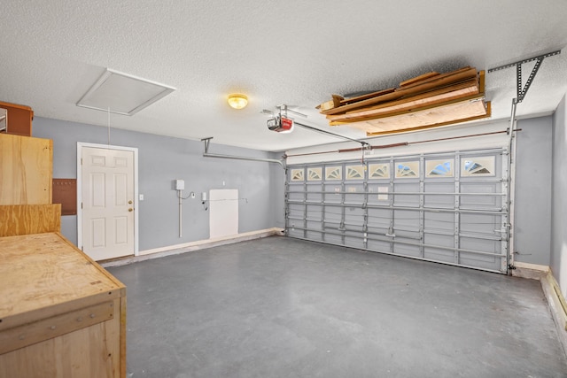 garage with baseboards and a garage door opener