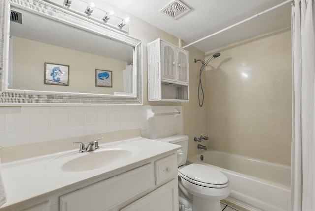 full bath featuring visible vents, tile walls, toilet, shower / bath combination with curtain, and vanity