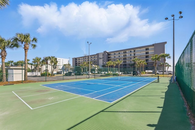 view of sport court with community basketball court and fence