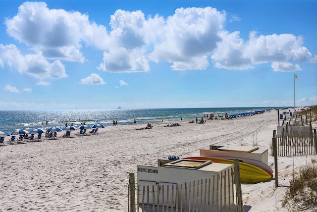 view of water feature with a beach view