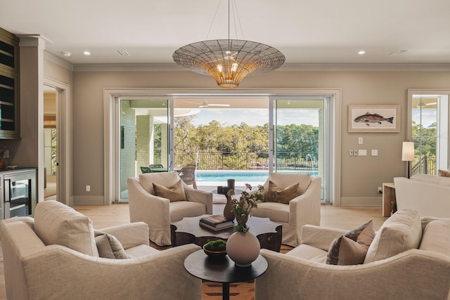 living area with wine cooler, recessed lighting, light wood-style flooring, ornamental molding, and baseboards