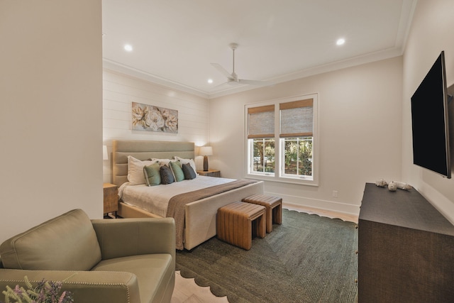 bedroom featuring recessed lighting, ornamental molding, a ceiling fan, wood finished floors, and baseboards