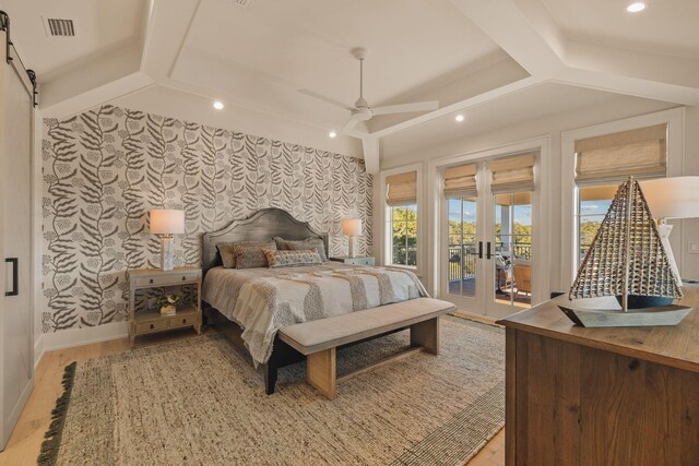 bedroom featuring light wood-style flooring, visible vents, baseboards, access to outside, and wallpapered walls