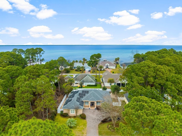 drone / aerial view with a water view