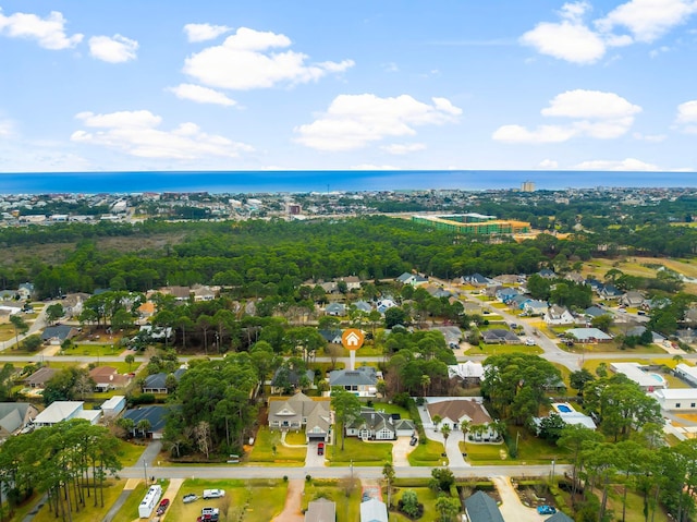 birds eye view of property featuring a water view and a residential view