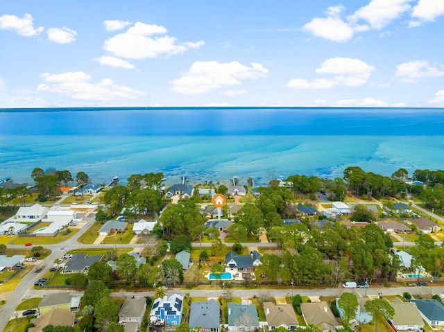 bird's eye view with a water view and a residential view