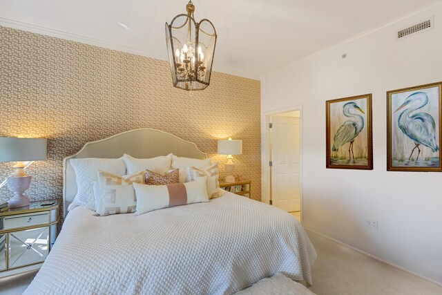 carpeted bedroom with a chandelier, ornamental molding, visible vents, and wallpapered walls