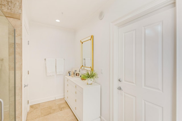 hall featuring baseboards, ornamental molding, and recessed lighting