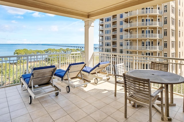 view of patio featuring a water view