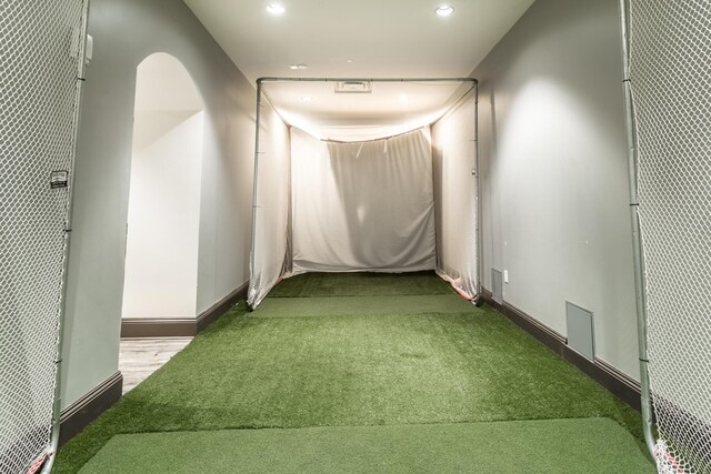 interior space featuring carpet floors, recessed lighting, and baseboards