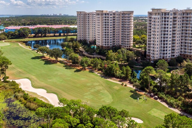 bird's eye view featuring a view of city, a water view, and golf course view