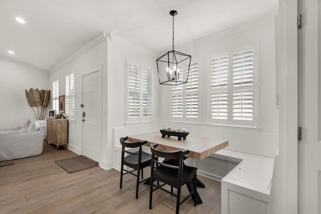 846 Cannon Ln, Destin, FL 32541 - dining area featuring baseboards, breakfast area, ornamental molding, an inviting chandelier, and light wood-style floors