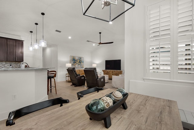 846 Cannon Ln, Destin, FL 32541 - workout room featuring recessed lighting, a ceiling fan, visible vents, vaulted ceiling, and light wood-style floors