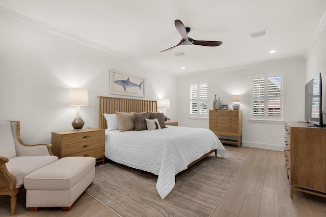 846 Cannon Ln, Destin, FL 32541 - bedroom with crown molding, light wood finished floors, recessed lighting, visible vents, and baseboards