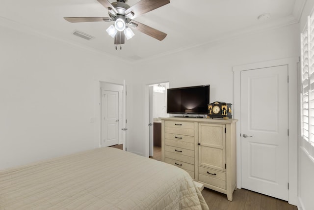 846 Cannon Ln, Destin, FL 32541 - bedroom with visible vents, wood finished floors, and ornamental molding