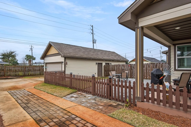 846 Cannon Ln, Destin, FL 32541 - exterior space featuring a garage, fence private yard, and grilling area