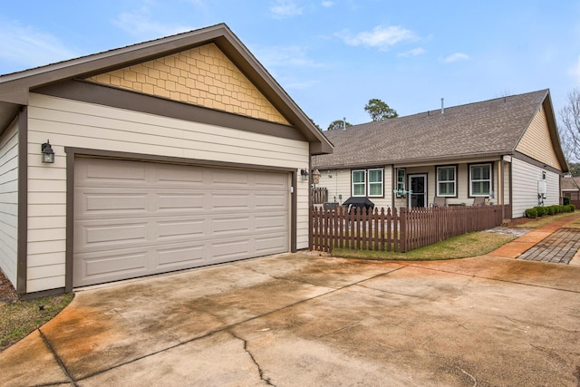846 Cannon Ln, Destin, FL 32541 - ranch-style house with a garage, fence, concrete driveway, and roof with shingles