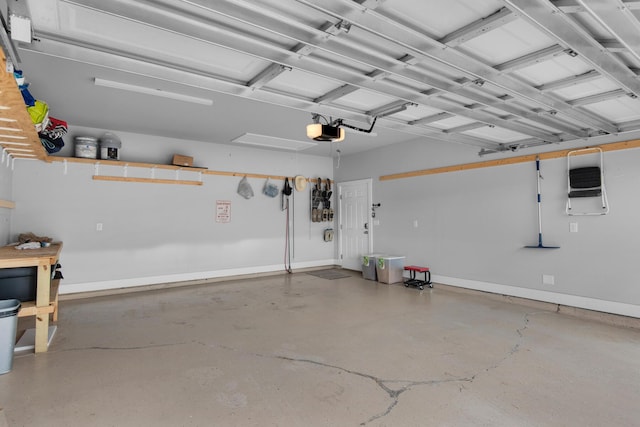 846 Cannon Ln, Destin, FL 32541 - garage with baseboards and a garage door opener