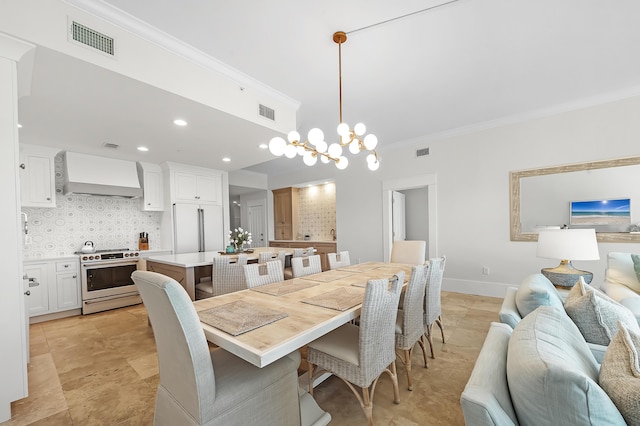 dining area with baseboards, visible vents, and ornamental molding