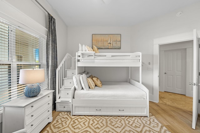 bedroom with light wood-type flooring