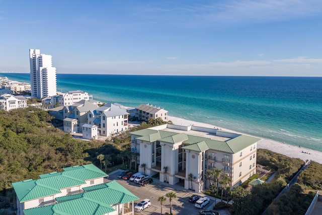 bird's eye view featuring a beach view and a water view