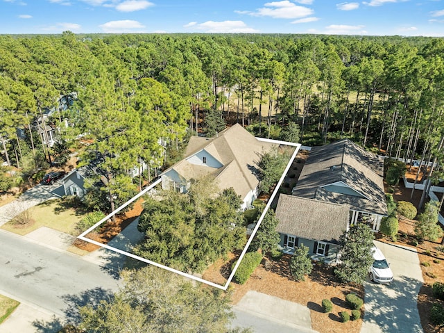 bird's eye view with a view of trees