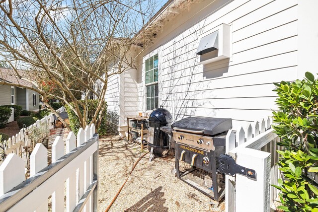 view of patio / terrace with fence and grilling area